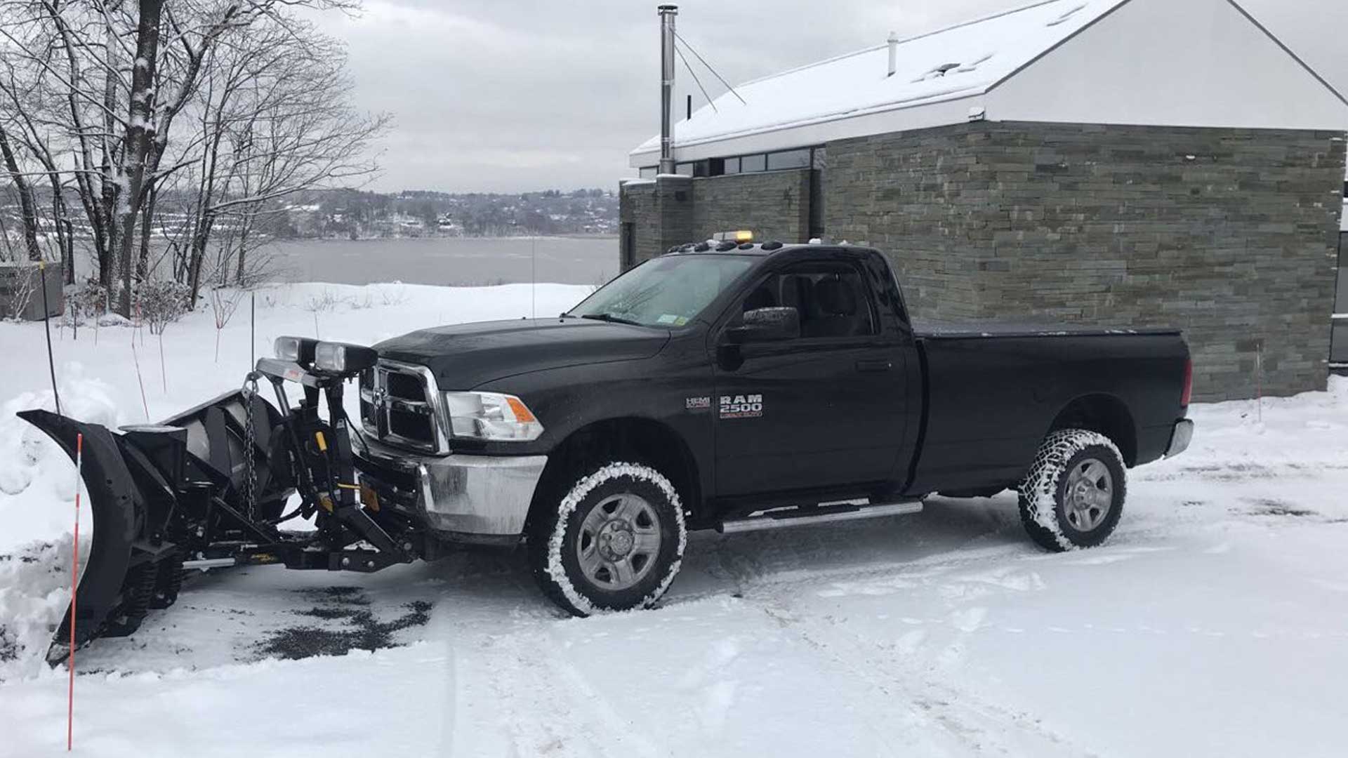 Our work truck with a plow attached to the front prepared for the first snow of the season.